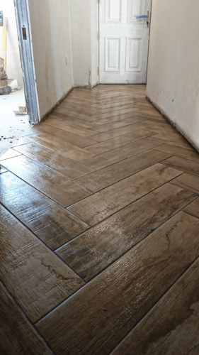 Shane Daly Tiling - Wood Effect Herringbone Tile - Hallway